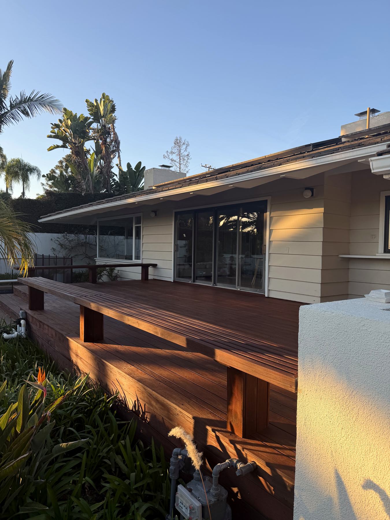 A modern Santa Barbara home exterior with wood siding, cleaned at low pressure.