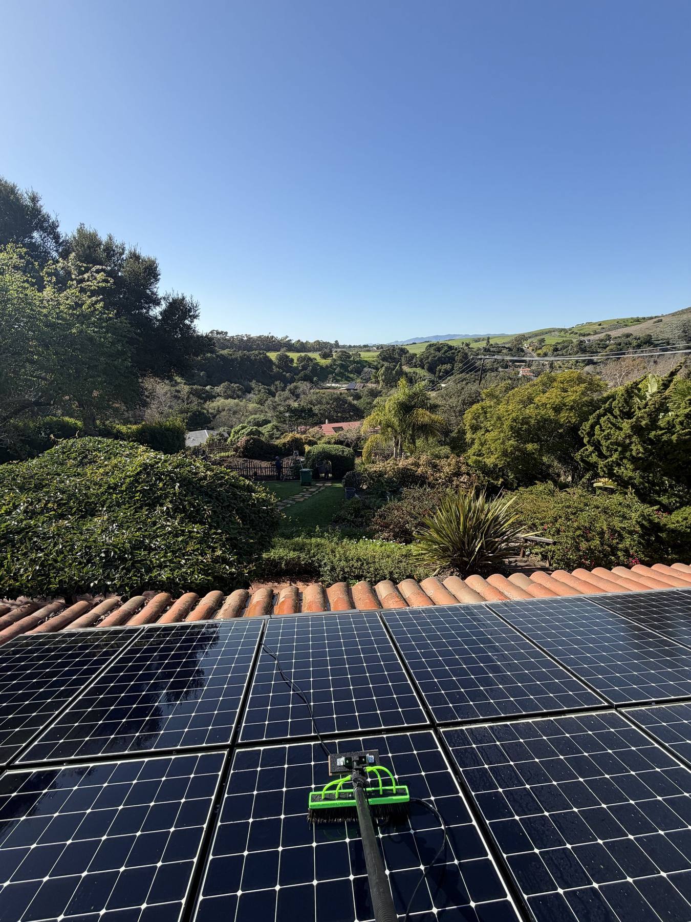 A solar array with the Ventura foothills behind it.