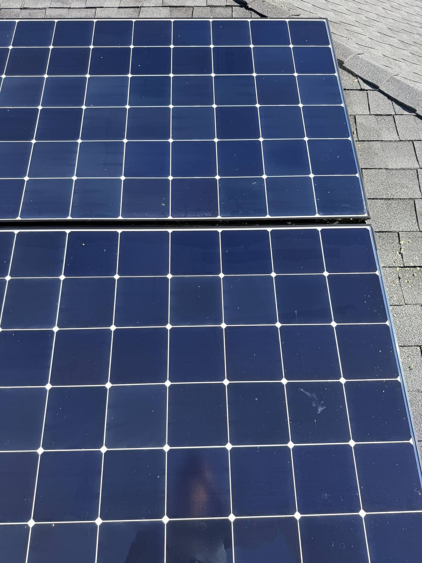 A solar panel cleaned to a clear, reflective finish above Santa Barbara.